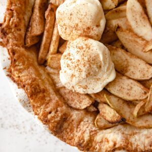 apple cheddar pie with ice cream on top
