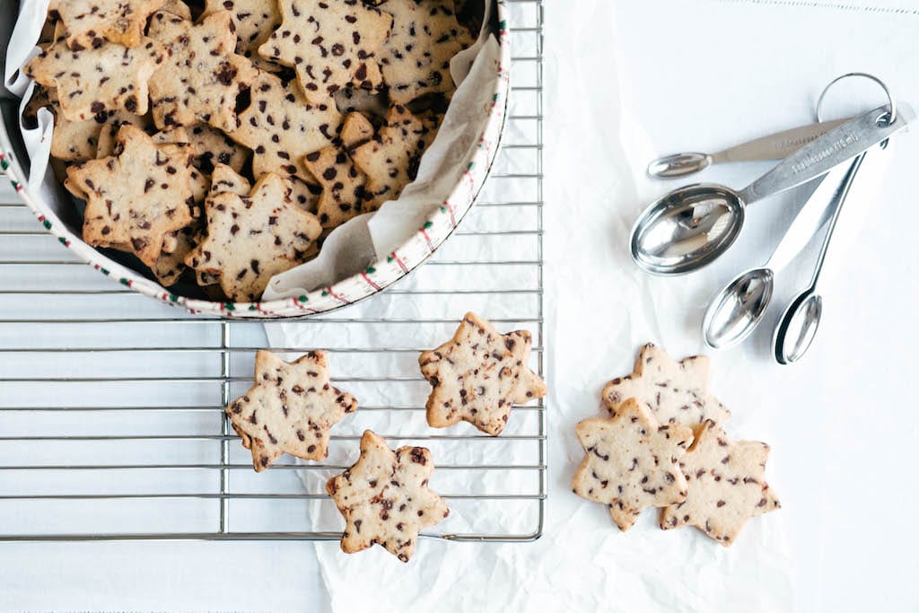 Star shaped crispy chocolate chip cookies with measuring spoon 