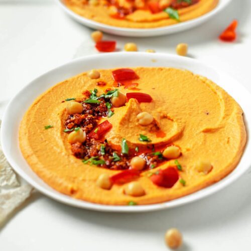 red pepper hummus in a bowl