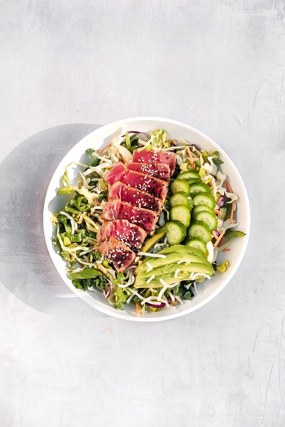 simplesearedahituna in a bowl with salad