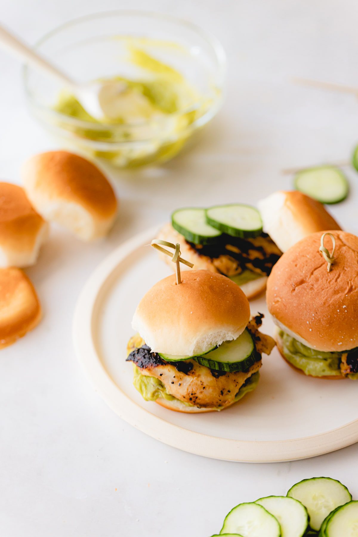 Avocado Ranch Chicken Sliders on a white plate