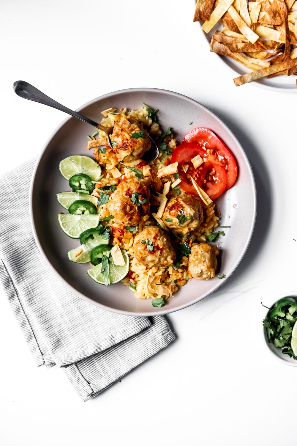 large bowl of ground chicken meatballs