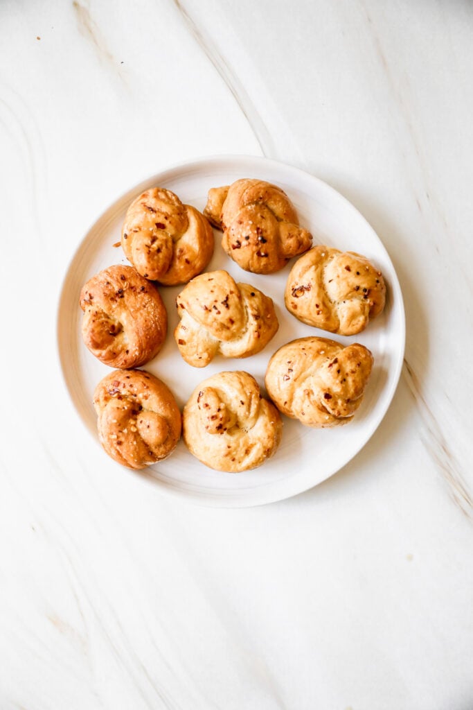 plate of pretzel knots on a marble background 