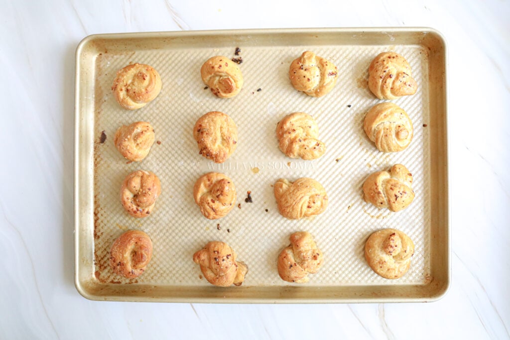 baked pretzel knots on a Williams Sonoma sheet tray 