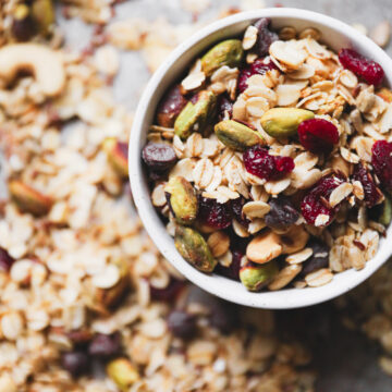 homemade cranberry pistachio granola in a white dish