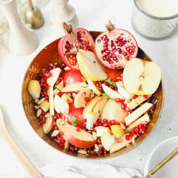 bowl of fruit salad in a gold bowl