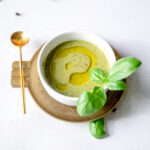 basil balsamic vinaigrette in a white bowl with tasting spoon