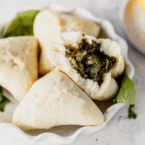 spinach fatayer in a white bowl