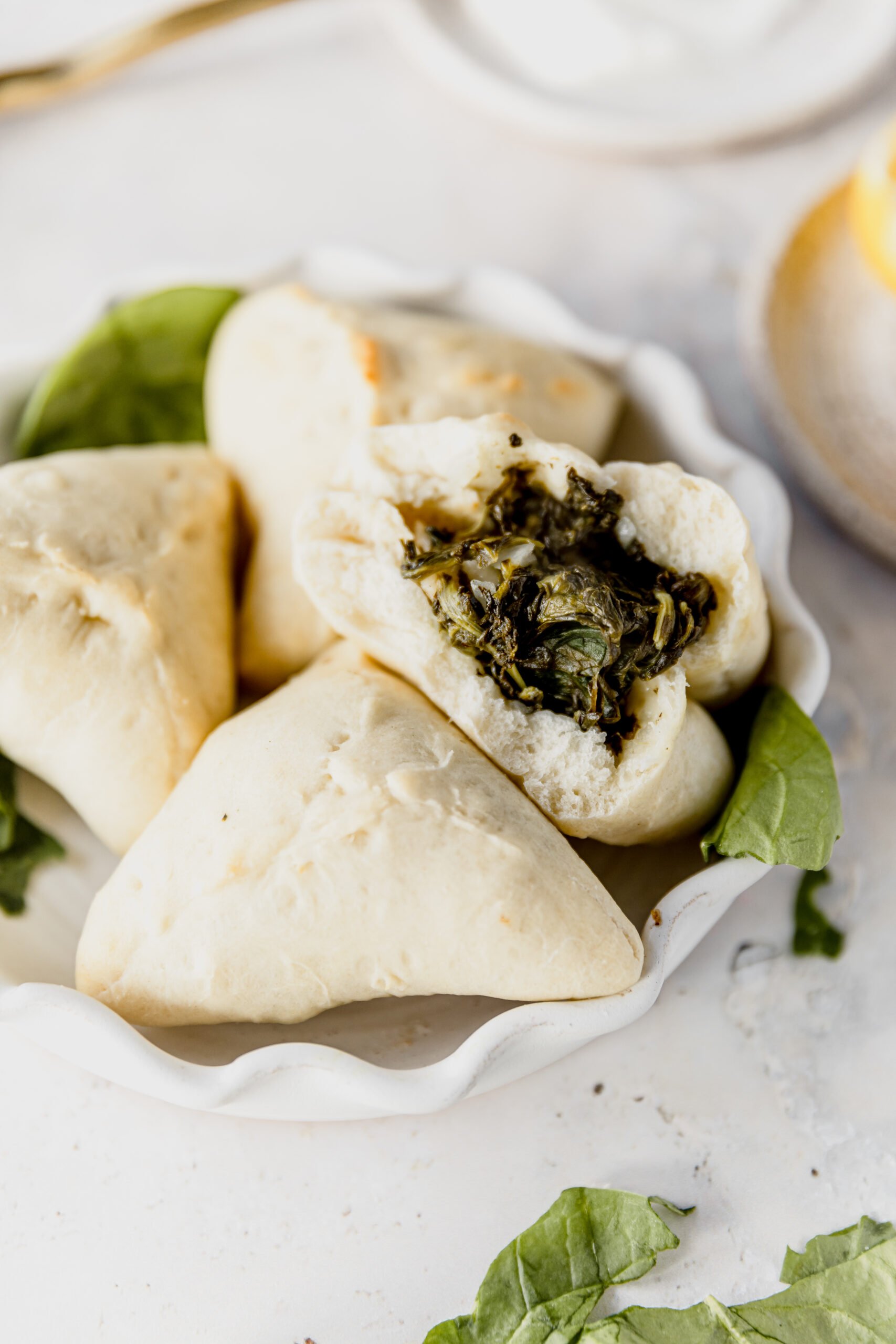 spinach fatayer in a white bowl