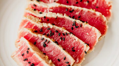 seared ahi tuna sliced and garnished with black sesame seeds