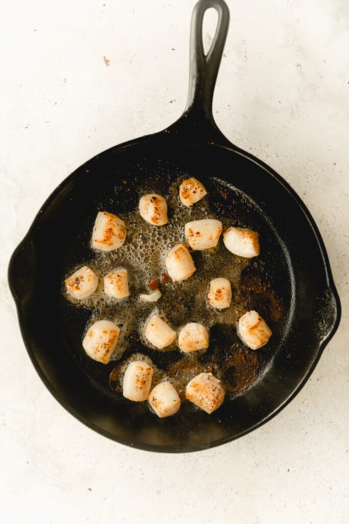 scallops in a cast iron pan
