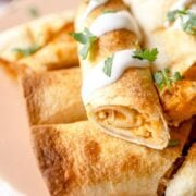 Air fried chicken taquito cut in half.