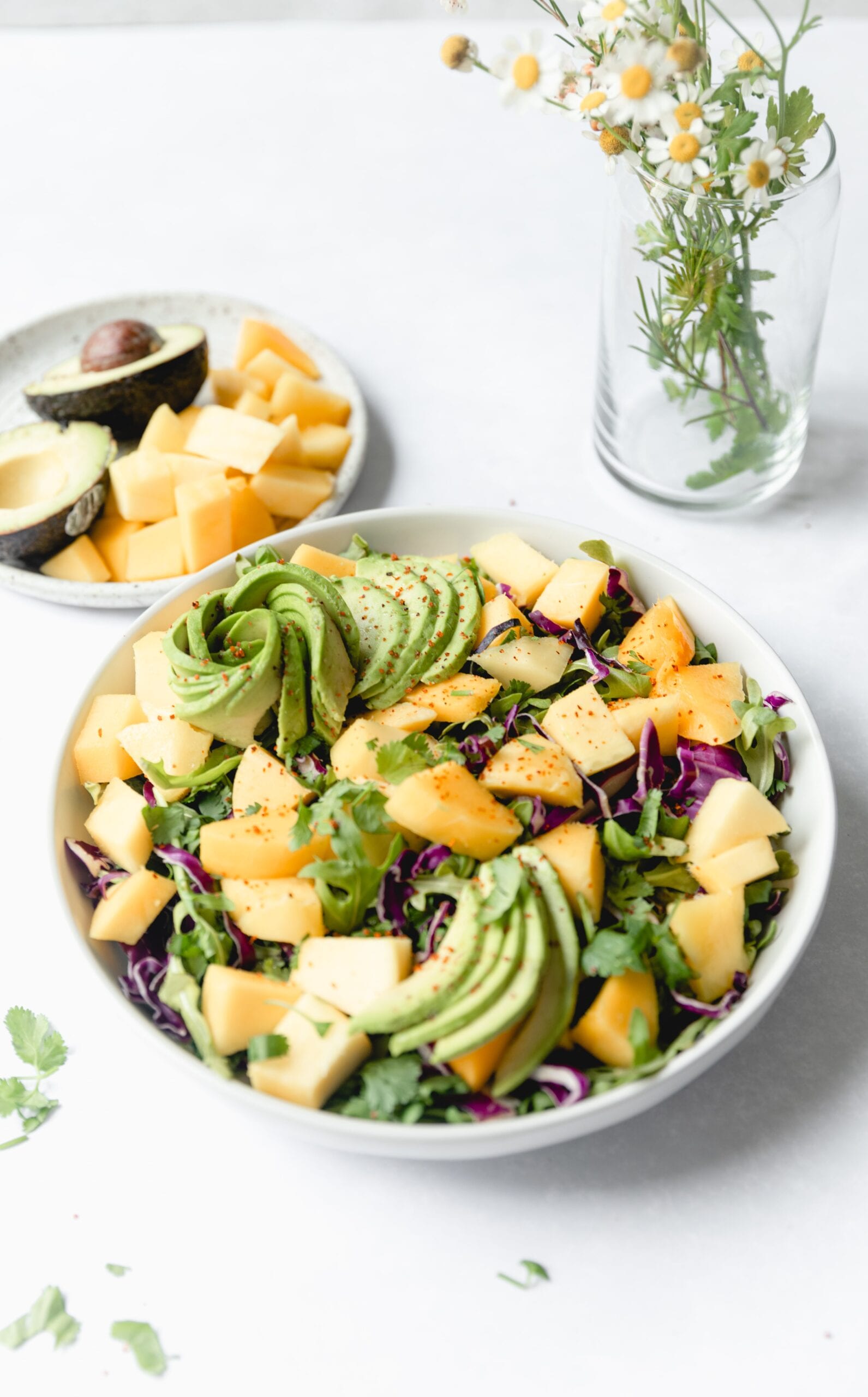 white bowl with mango salad