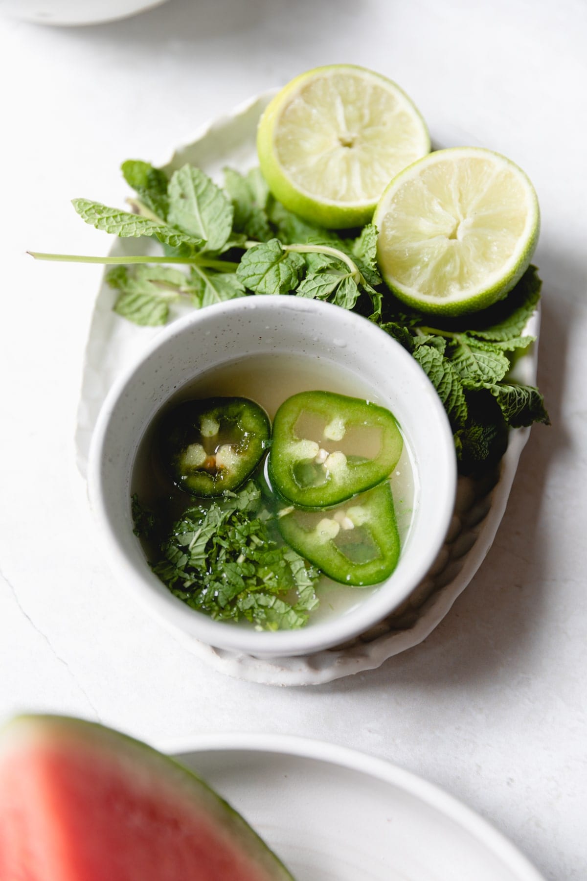 spicy mojito dressing in a white bowl