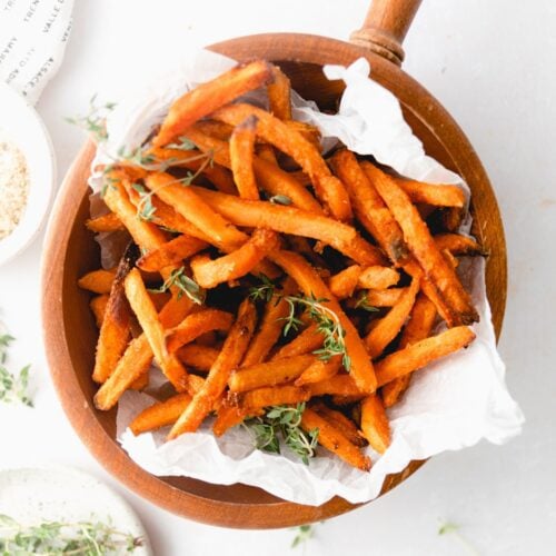 wooden bowl with crispy sweet potato fries