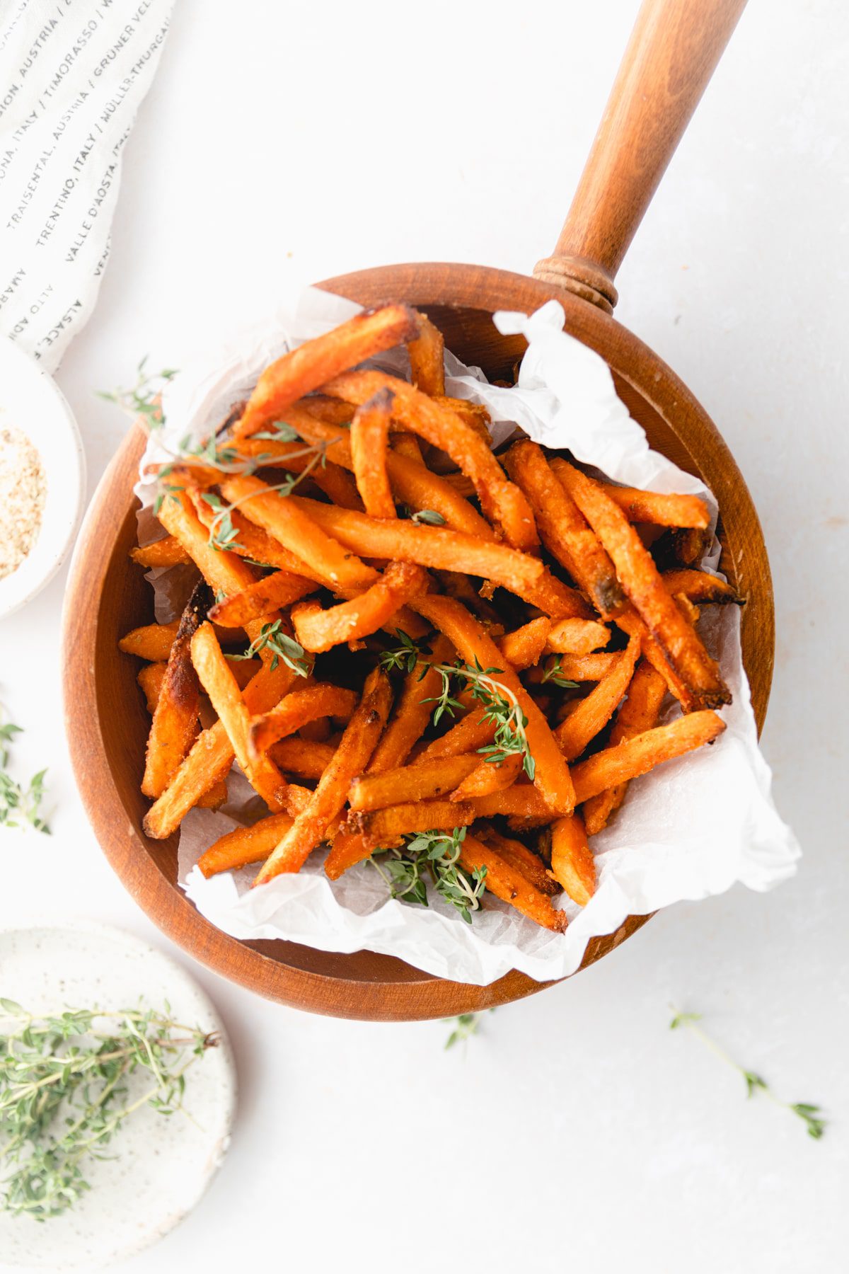 wooden bowl with crispy sweet potato fries