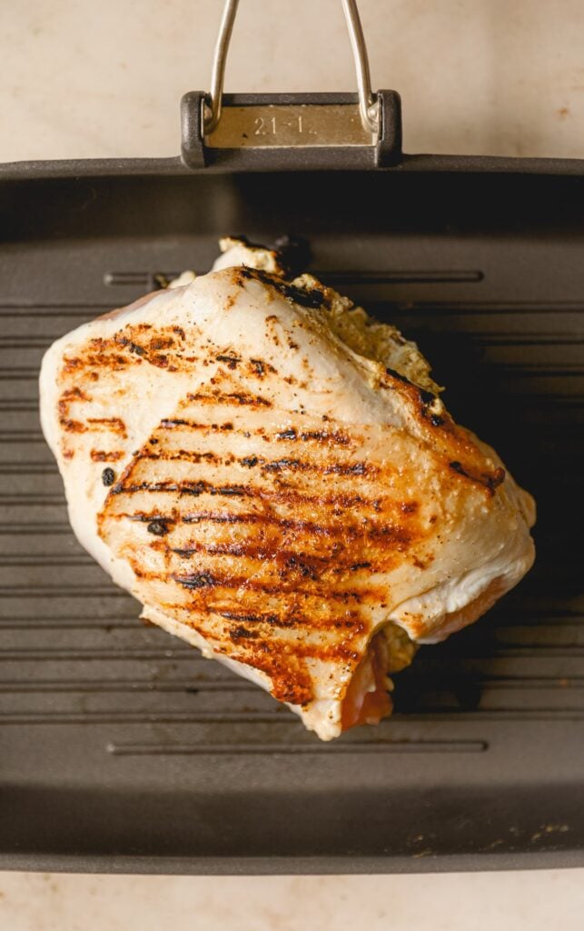 grilling a turkey breast on a grill pan