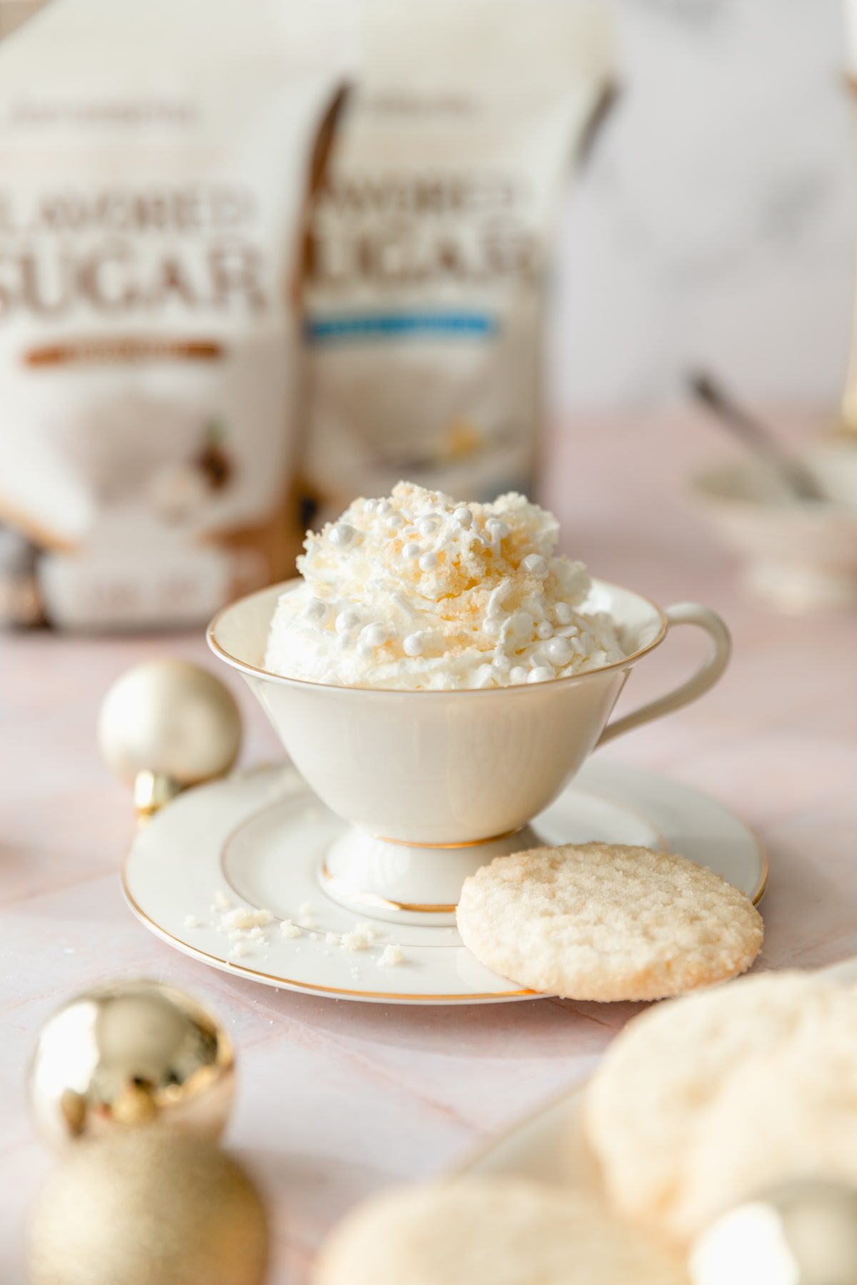 sugar cookie latte in a white and gold mug