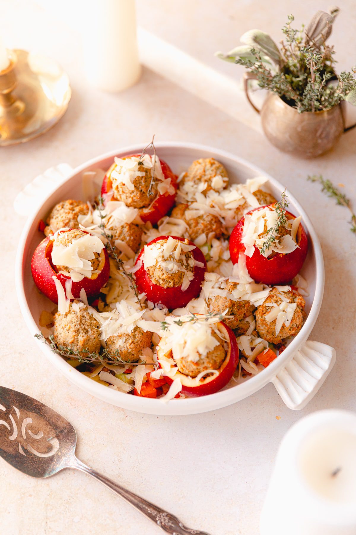 white baking dish with savory stuffed apples