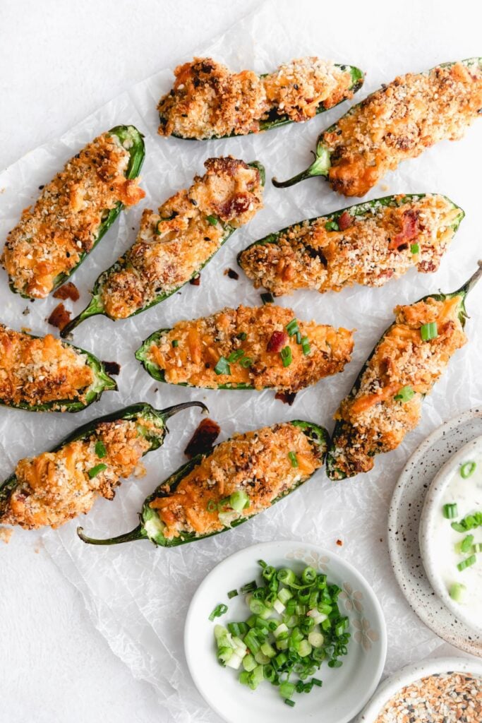 air fried jalapeno poppers with bacon on parchment paper