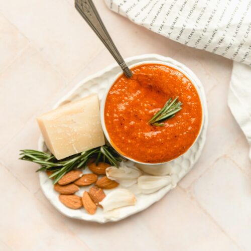 pesto rosso in a bowl with a spoon