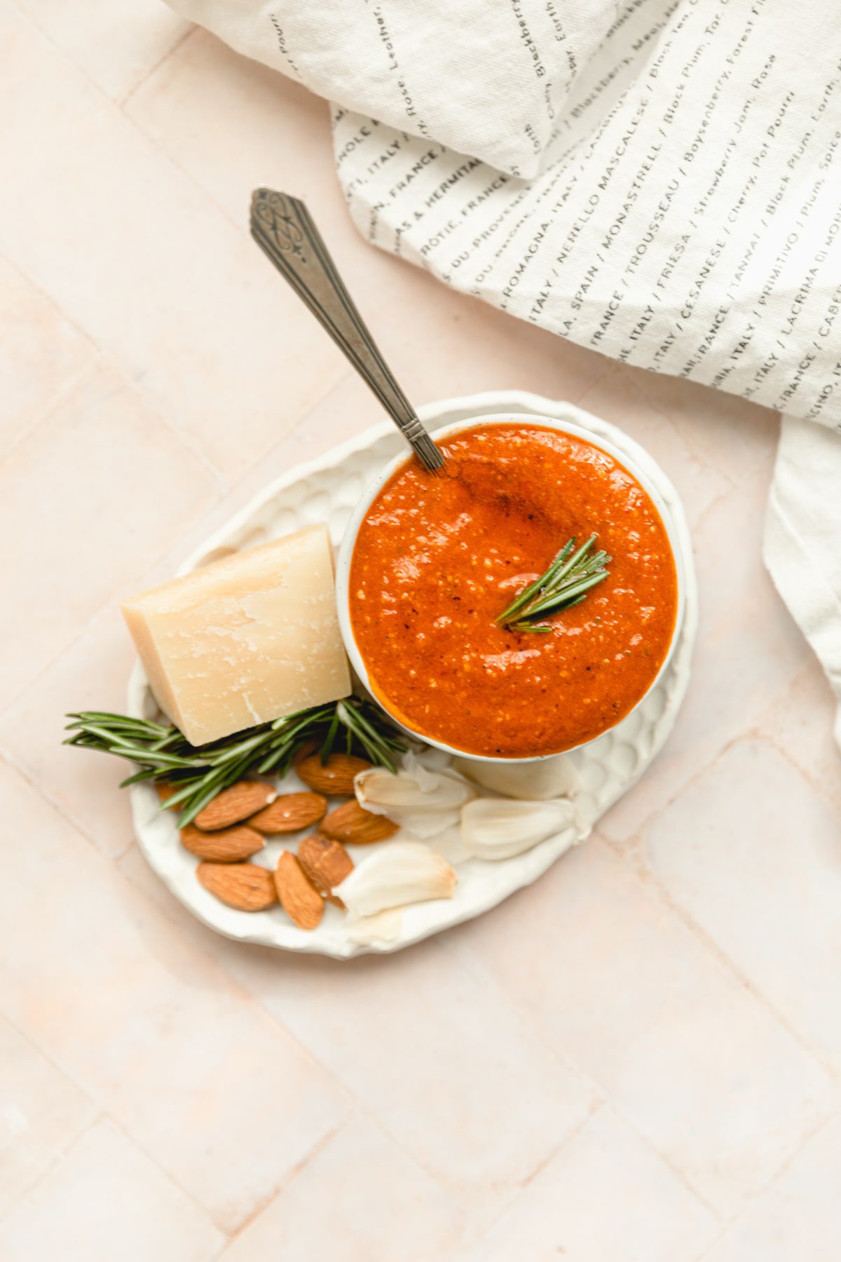 pesto rosso in a bowl with a spoon