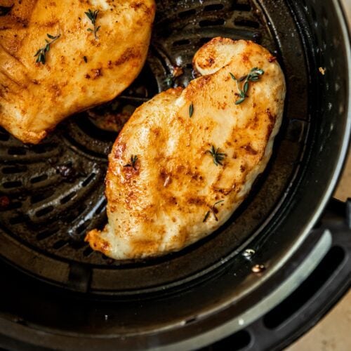 air fryer chicken breasts in the basket