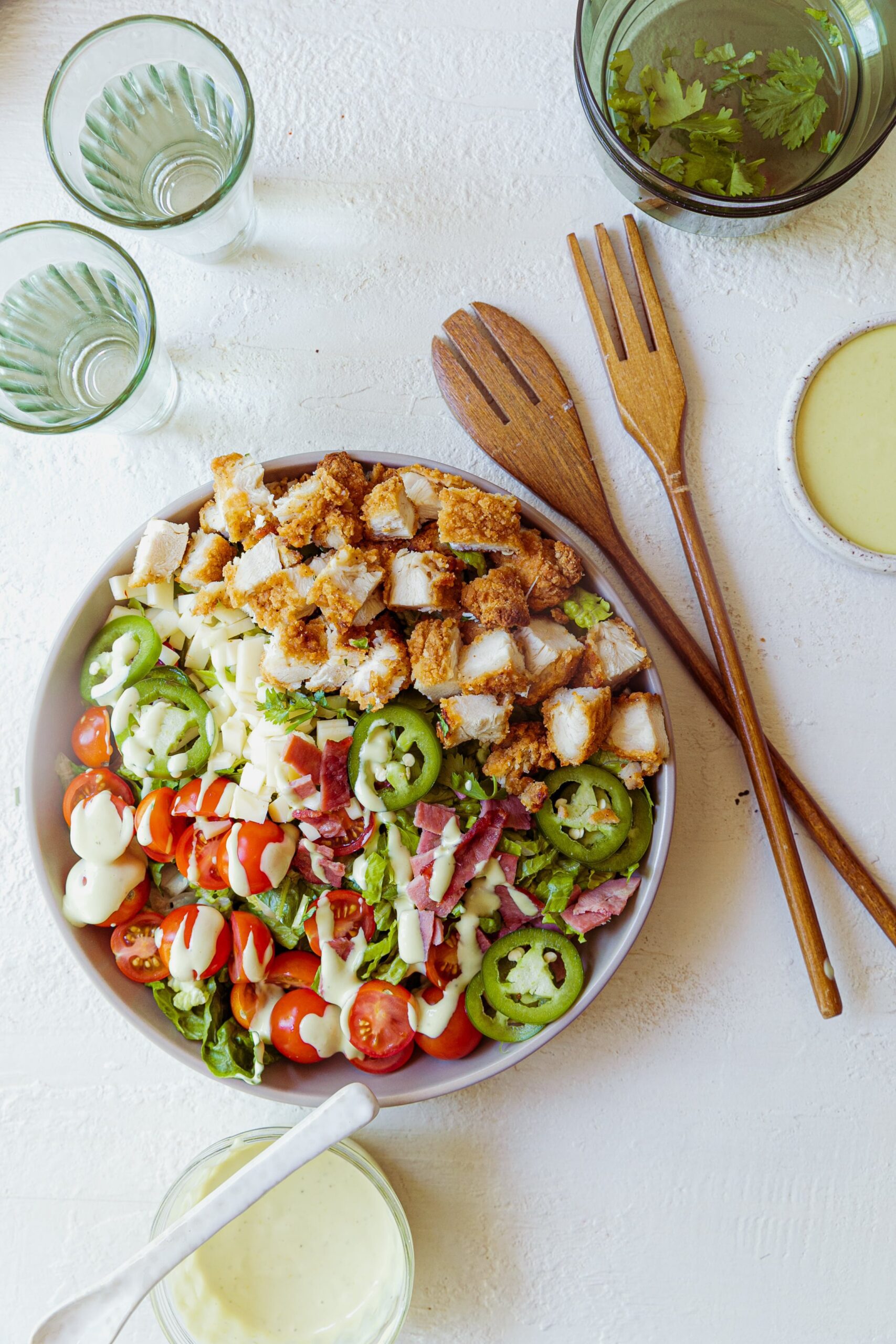 bowl of jalapeno popper salad with utensils