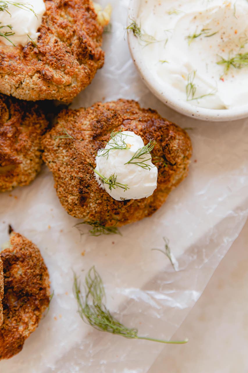 potato fritter topped with sour cream