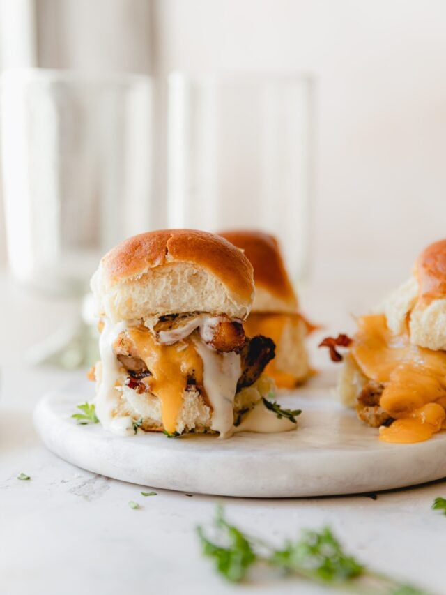 chicken bacon sliders on a white plate