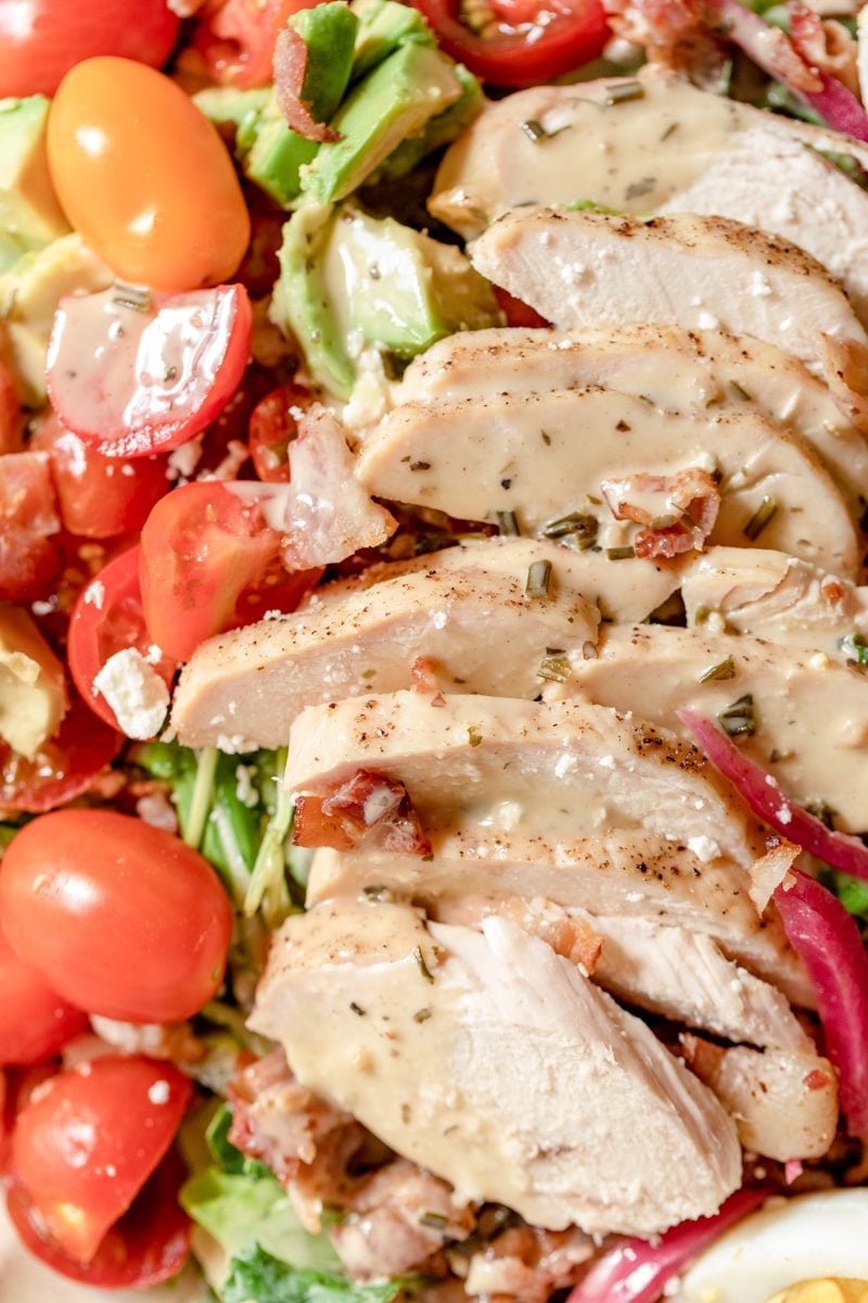 close up shot of chicken on the Cobb salad