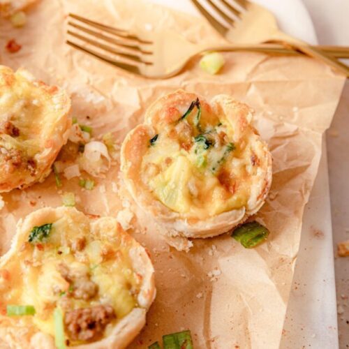 ground turkey mini quiche on parchment paper