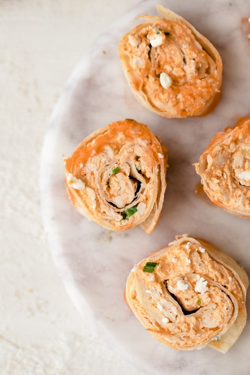 overhead photo of chicken pinwheels on a plate