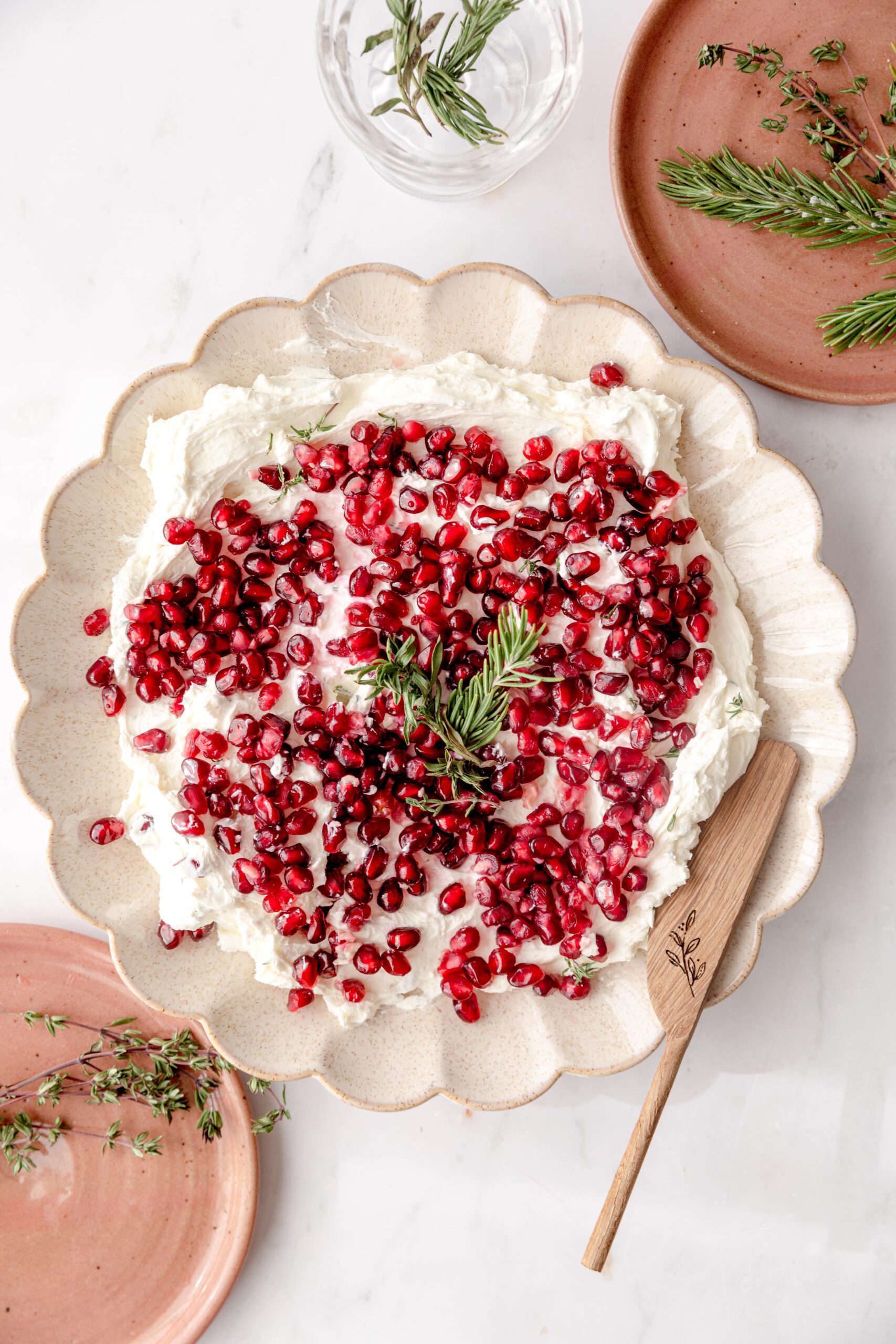 scalloped plate of goat cheese dip