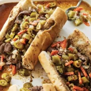 Pepper and Shaved Steak sandwich on a white platter