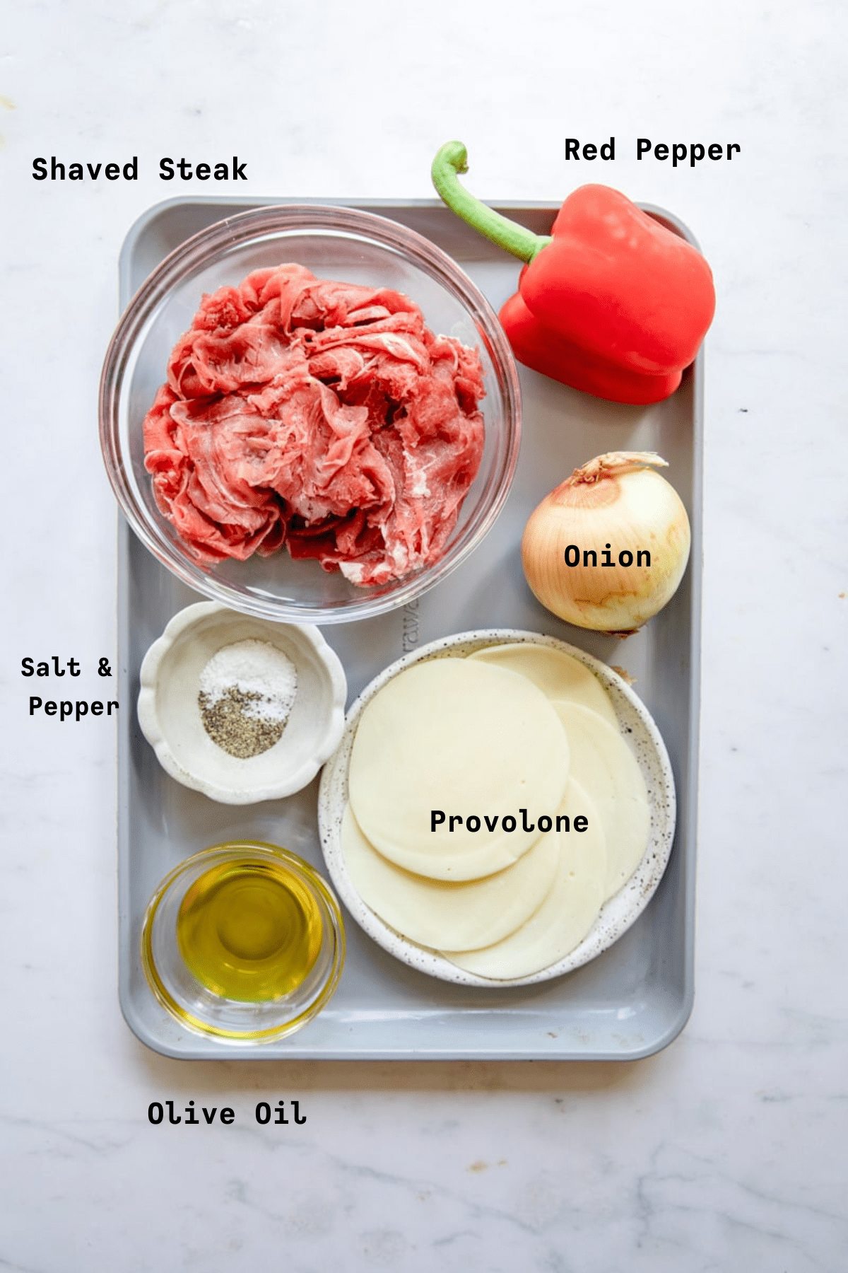 overhead photo of Philly cheesesteak recipe ingredients