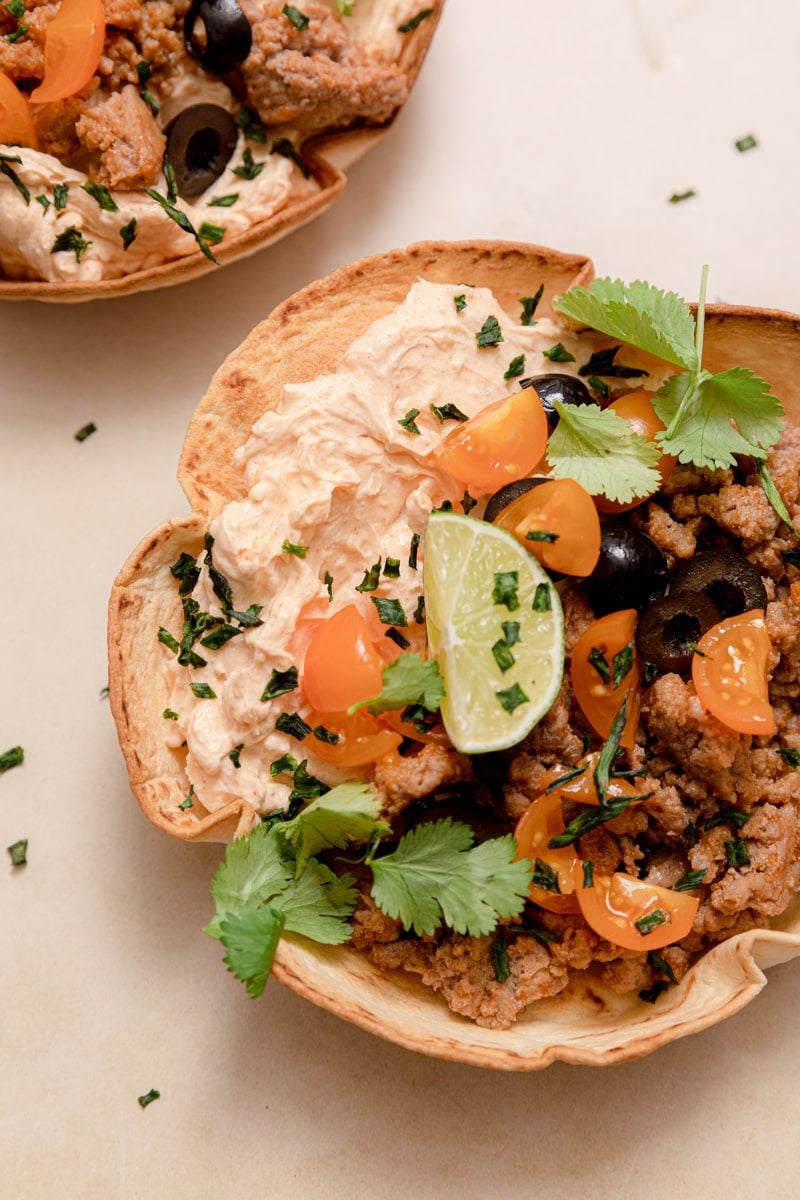 close up photo of creamy taco dip in a bowl