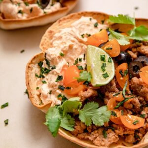 close up of taco dip in a tortilla bowl