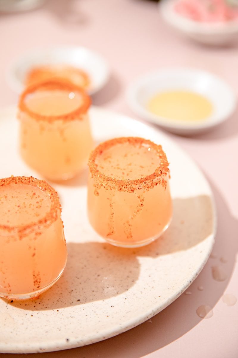 white plate with 3 Mexican candy shots