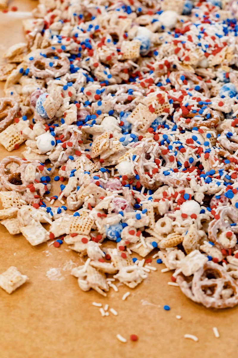 4th of July snack mix spread out on wax paper