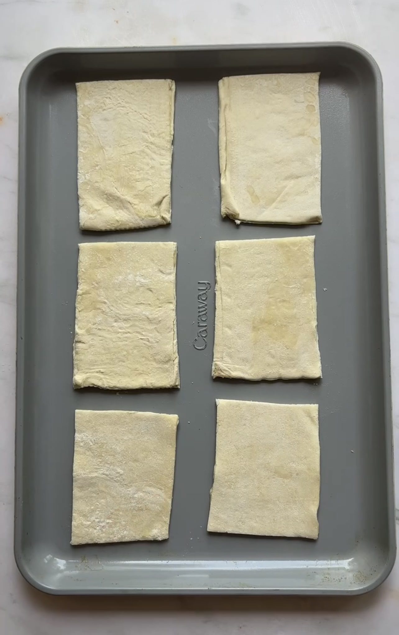 puff pastry rectangles on a cookie sheet
