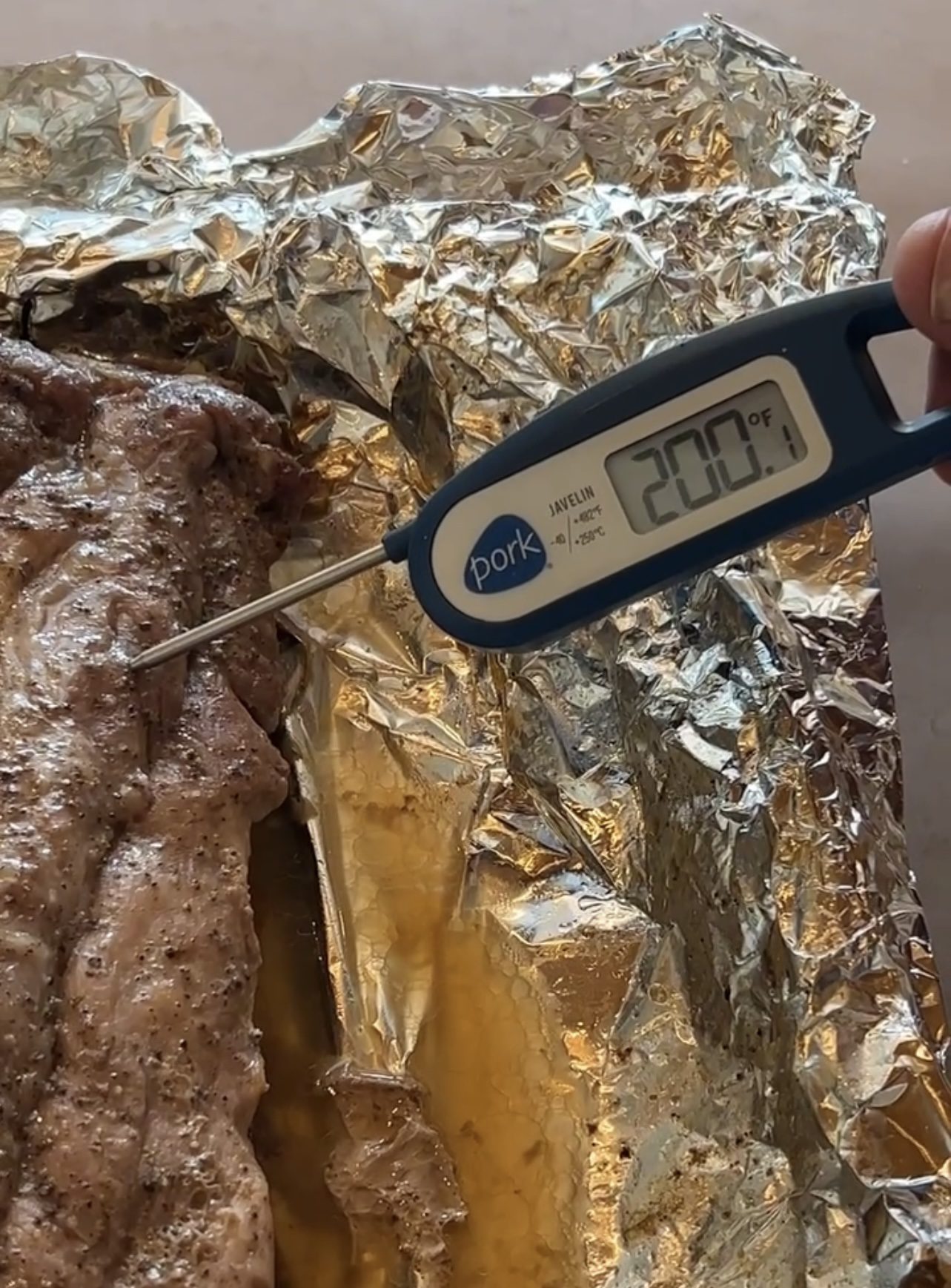 rack of ribs baked to 200 degrees internal temperature with the themometer in the rack of ribs 