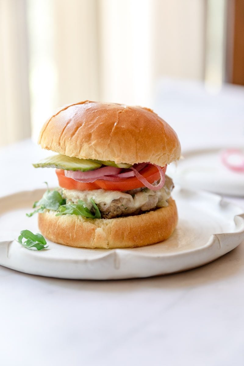 turkey burger on a white plate 