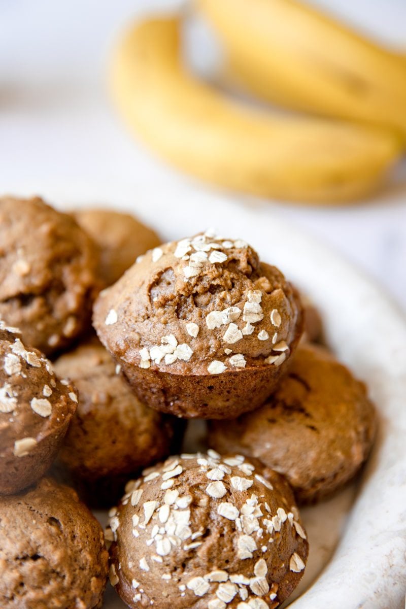 tray of pumpkin banana muffins with oats on top 