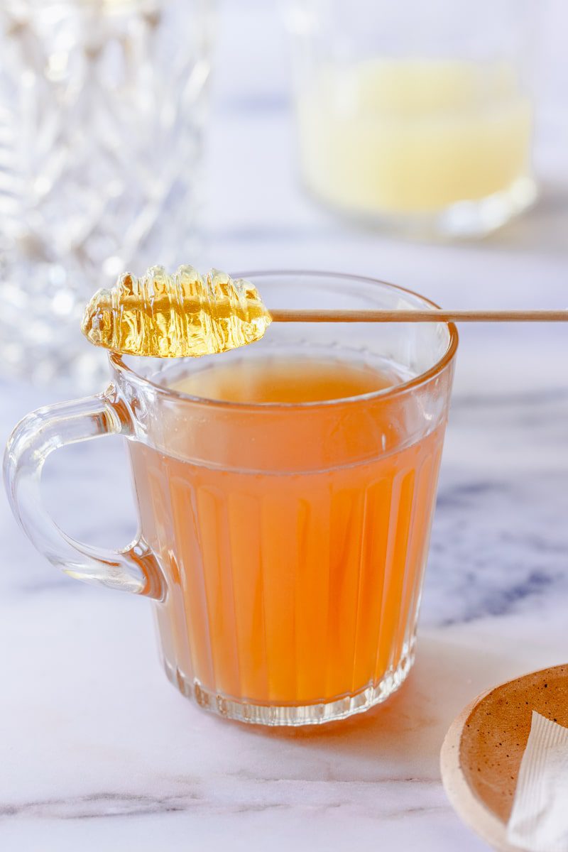 copycat Starbucks medicine ball tea with a honey stir stick 