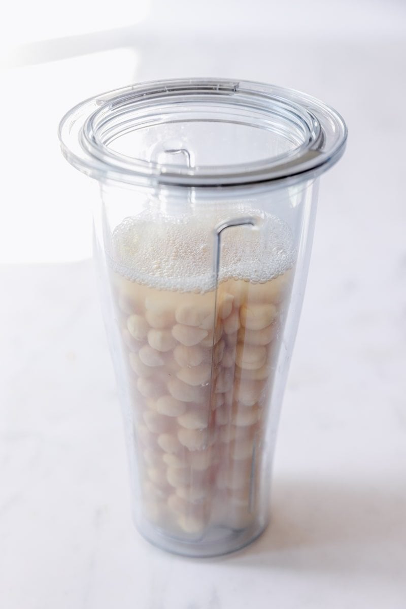 chickpeas and water in a blender cup