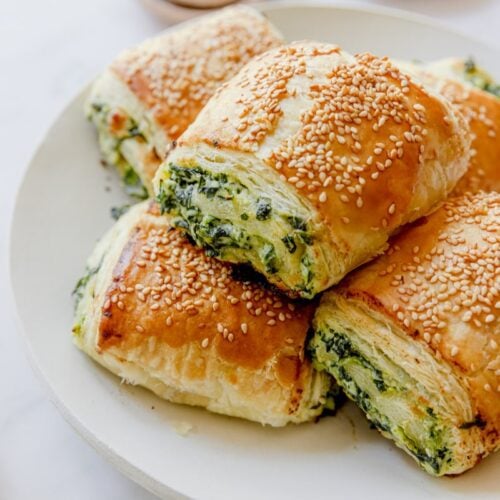 plate of spinach and ricotta rolls