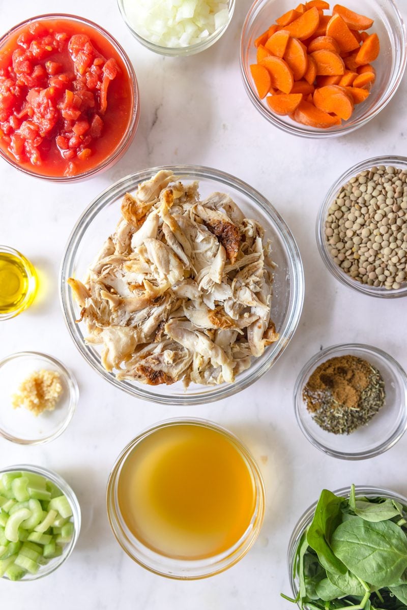 An overhead shot of all the ingredients needed to make leftover turkey lentil soup.