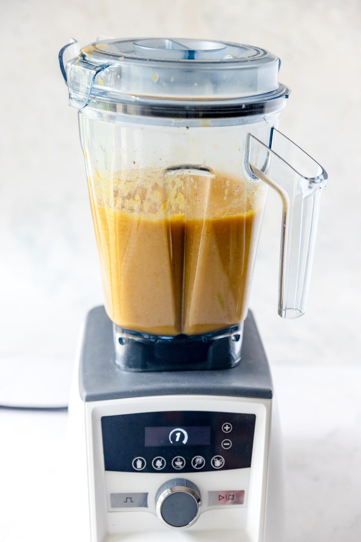 all roasted vegetables added to a blender and blended smooth with chicken stock.