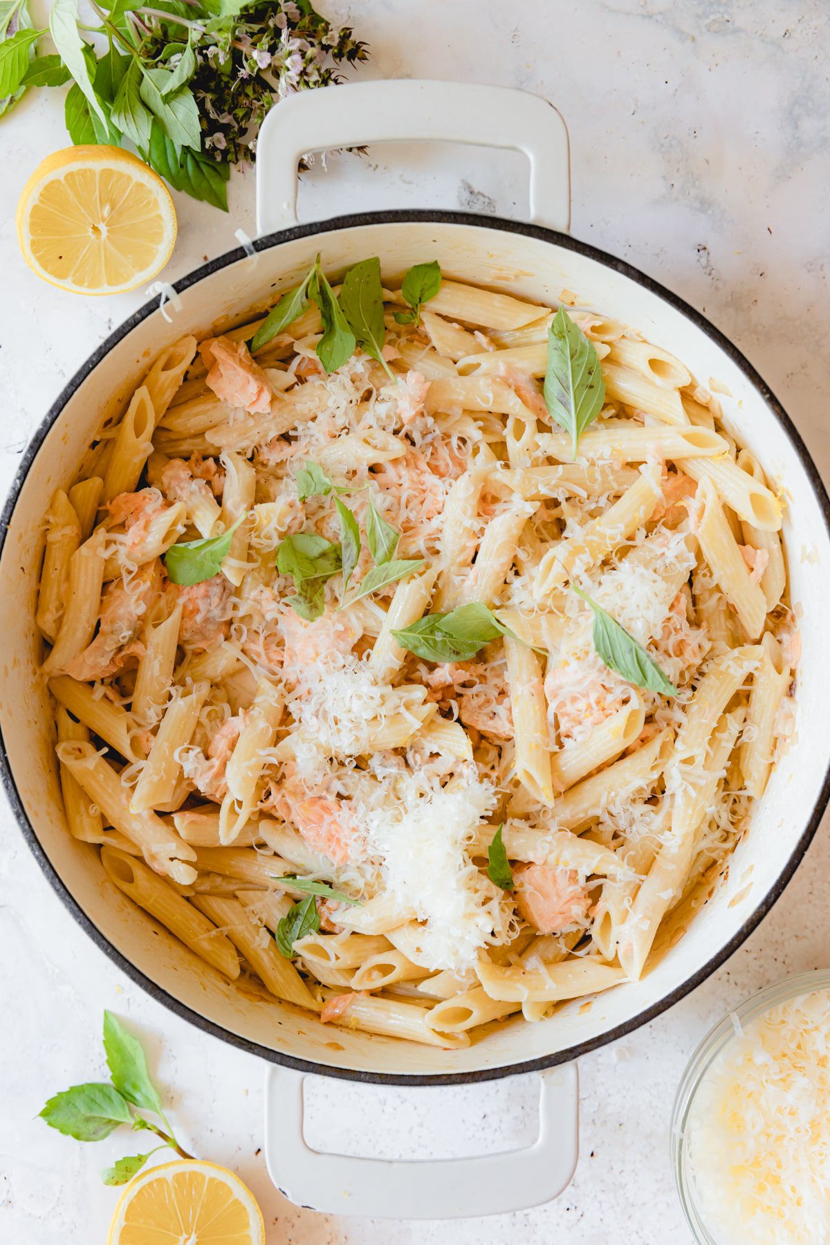 Final plated pasta al salmone in a white skillet. 